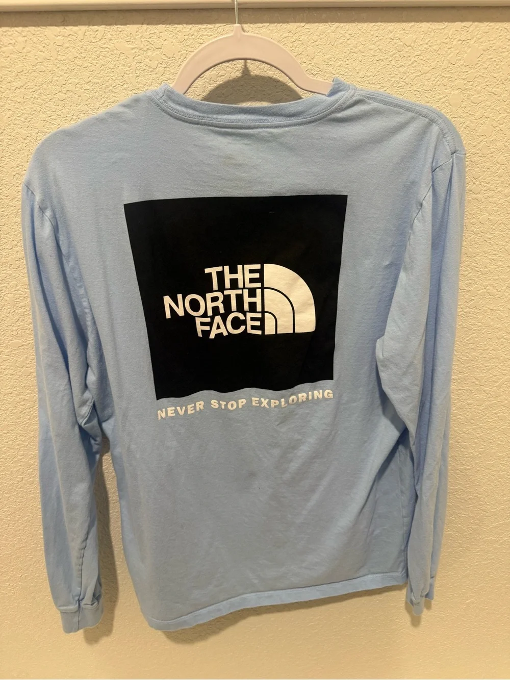 The North Face Men's Long-Sleeve Crew in Pale Blue with White Logo